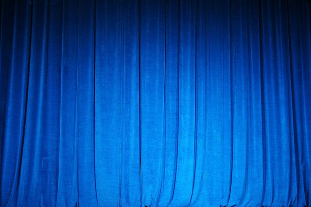 Photograph of blue velvet theatre curtain.