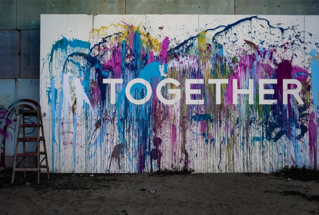 Picture of painted wall with the word 'together' on it