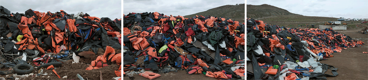 an endless pile of refugee life jackets on Molyvos, Lesbos, Greece
