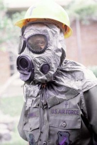 A member of the United States army in biohazard gear  http://upload.wikimedia.org/wikipedia/commons/1/1e/NBC-Mask_M-17.jpg