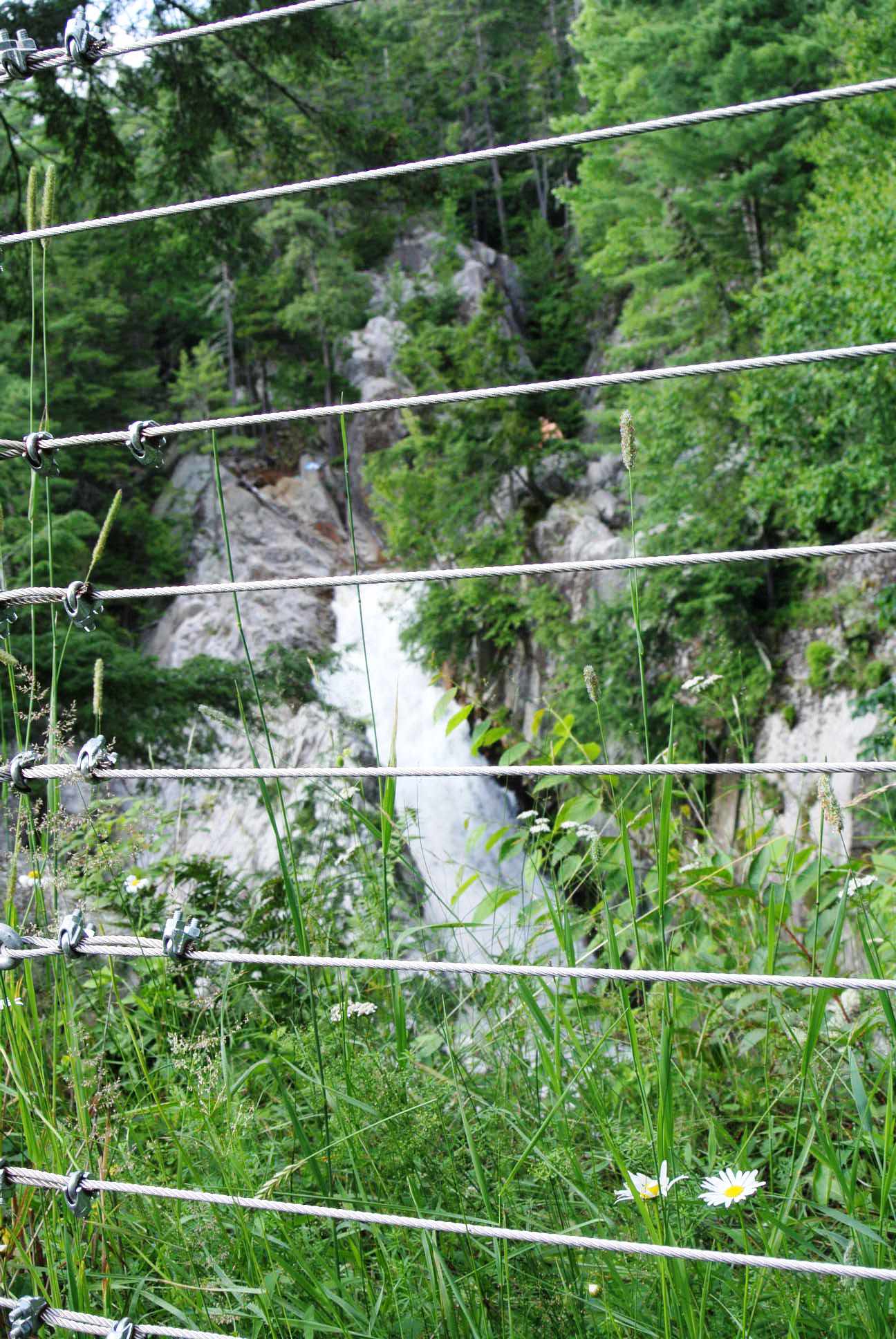 Falls of Lana behind safety fencing