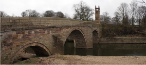 Photo by Wikipedia user Parrot of Doom on Wikipedia Commons. "RIngley old bridge."