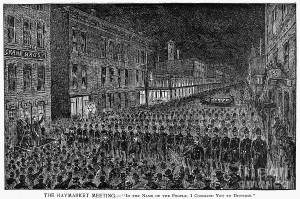 S. sees Sola amidst a crowd about to break into a riot (based on the Haymarket Square Incident, pictured above).