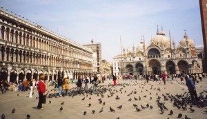 St Mark's Square, with the Basilica looming behind it. http://www.filmapia.com/sites/default/files/filmapia/pub/place/067-venice-st-marks-sq.jpg